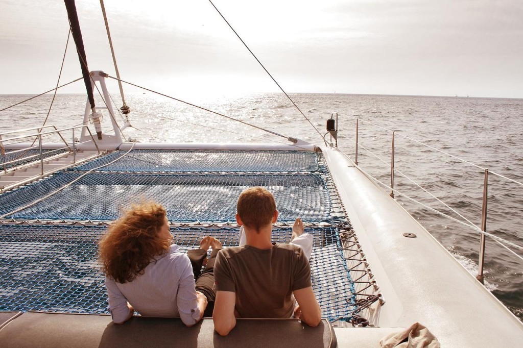 Picture of couple on yacht signifying happiness