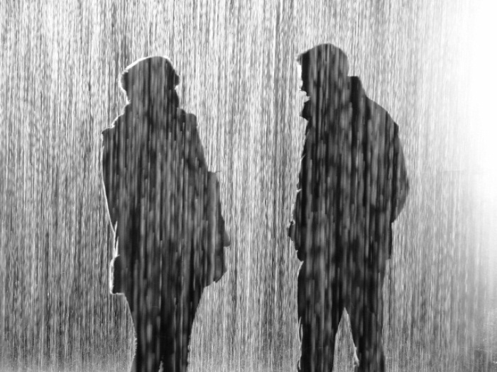 Picture of Uncomfortable Couple in Rain