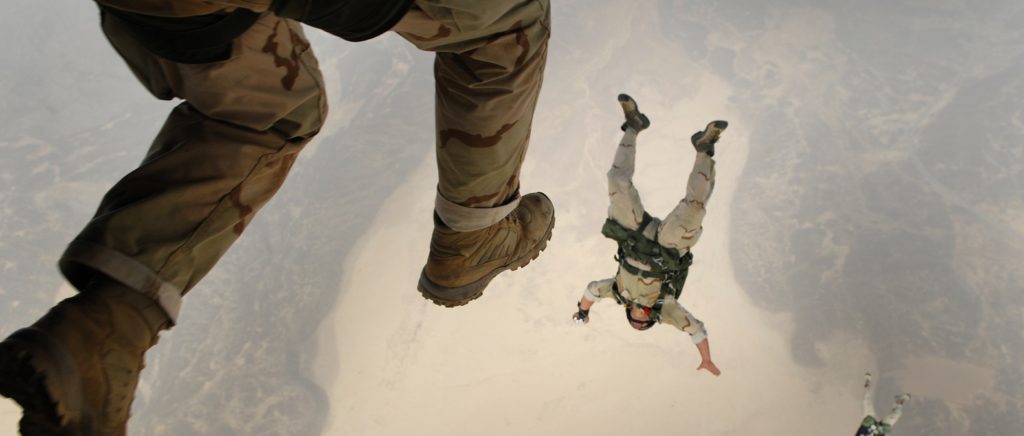 Military men skydiving