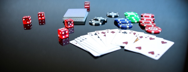 Playing cards, poker chips, and dice