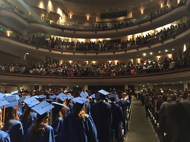 Graduates in graduation hall