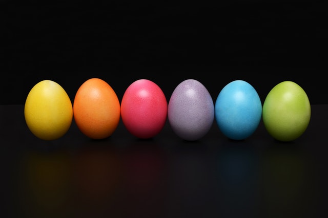Line of different colored eggs